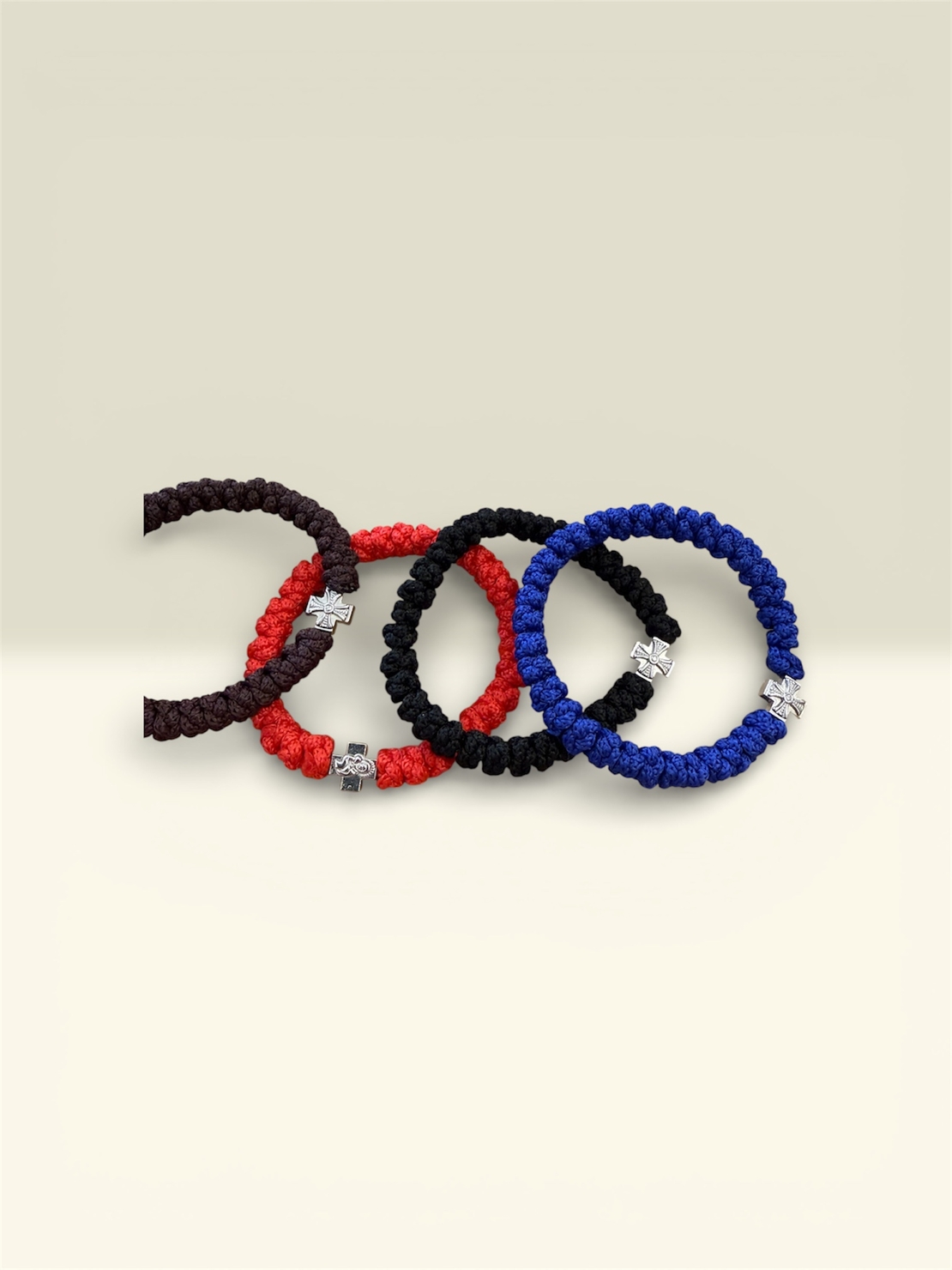 Плетена гривна с православен кръст – червена, черна и синя