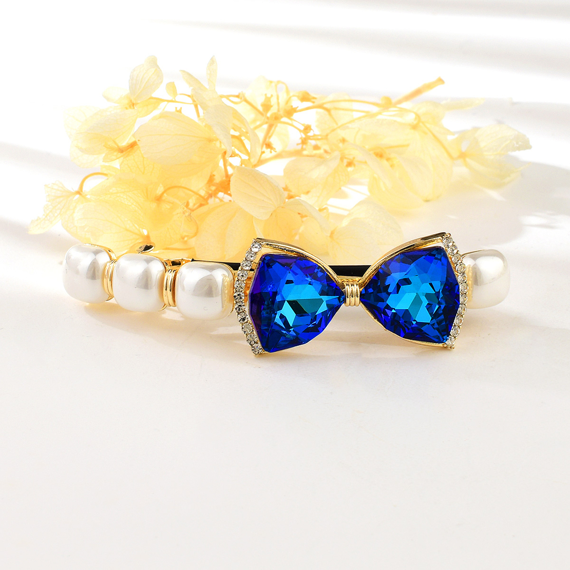 BLUE RIBBON HAIR CLIP YELLOW GOLD PLATING