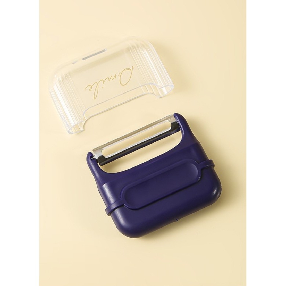 Decojitor/Curatator manual de legume si fructe, Flippy, portabil, cu magnet, doua lame, Inox, Mov, 6.7x6x1.6 cm