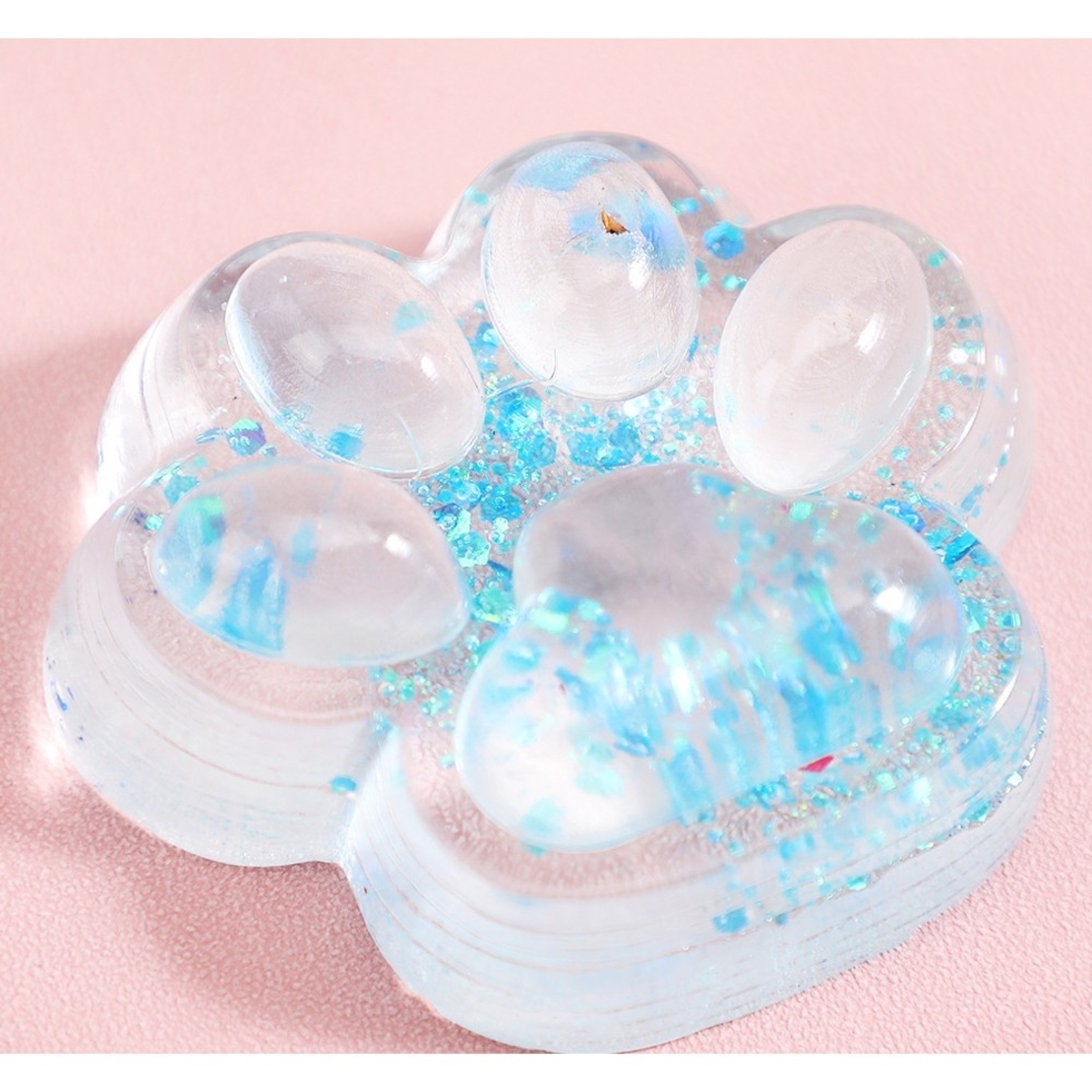 Jucarie Antistres Squishy, Flippy, cu Revenire Lenta, Squeeze Pinch Family, Model Cat Paw, 6.5 x 7 cm, din Tpr, 4-6 Ani, Model 4 Sclipici, Transparent