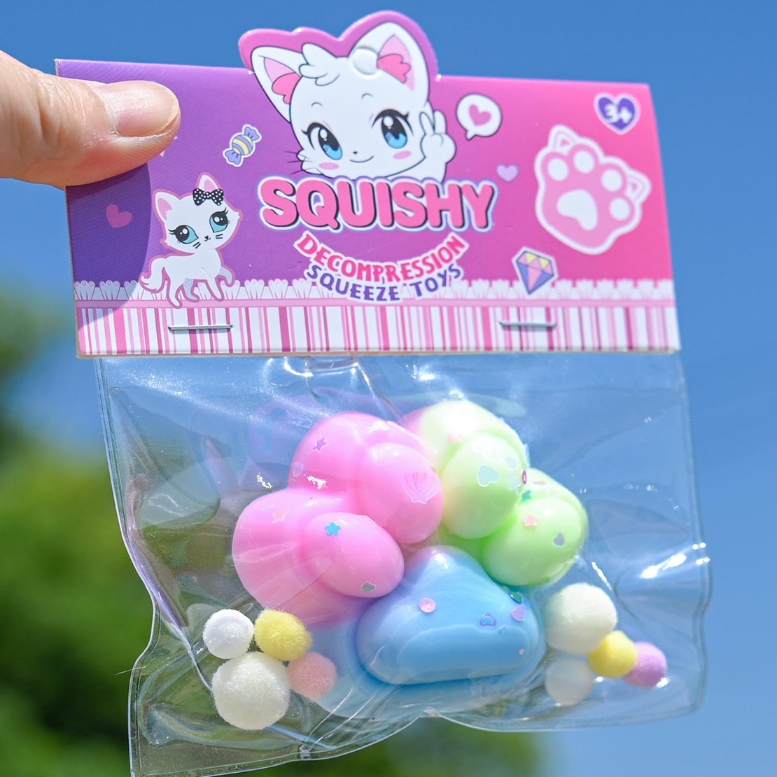 Jucarie Antistres Squishy, Flippy, cu Revenire Lenta, Labuta de Pisica Pufoasa, 7.5 cm, Ambalaj Transparent, Model 27057, Multicolor