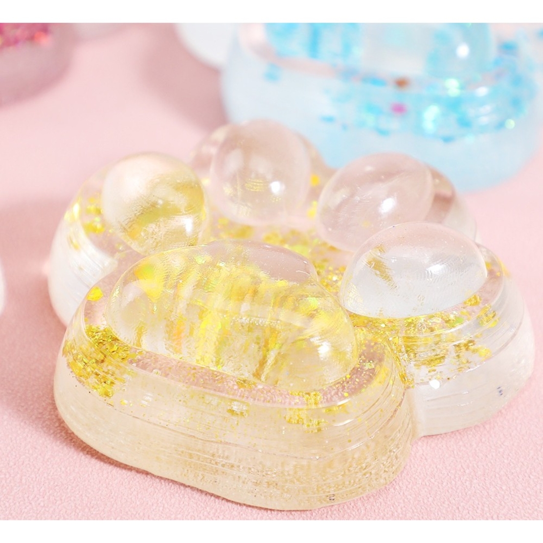 Jucarie Antistres Squishy, Flippy, cu Revenire Lenta, Squeeze Pinch Family, Model Cat Paw, 6.5 x 7 cm, din Tpr, 4-6 Ani, Model 4 Sclipici, Transparent