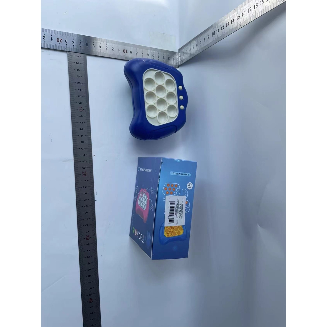 Joc Pop It, Flippy, consola, joc interactiv, antistres, cu baterii, Abs si silicon, Albastru, 12 x 10 x 5.8 cm
