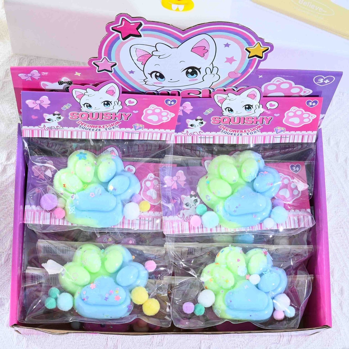 Jucarie Antistres Squishy, Flippy, cu Revenire Lenta, Labuta de Pisica Pufoasa, 7.5 cm, Ambalaj Transparent, Model 27059, Multicolor