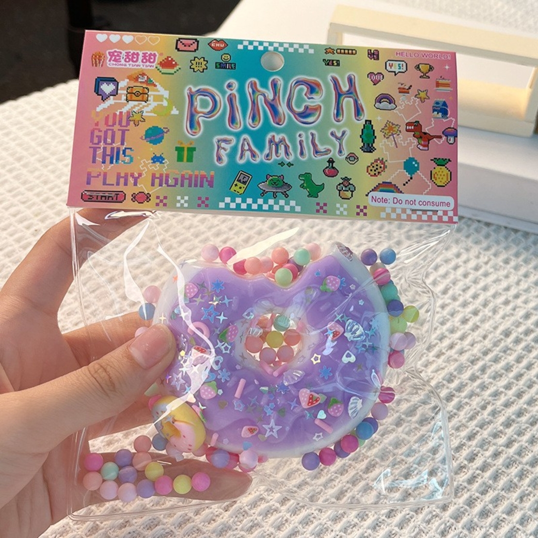 Jucarie Antistres Squishy, Flippy, cu Revenire Lenta, Squeeze Pinch Family, Model Gogoasa, 6x6 cm, 99g, Ambalaj Transparent, Mov