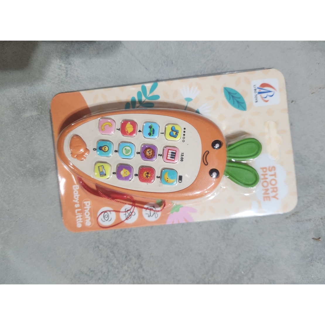 Jucarie Interactiva, Flippy, Telefon Inteligent, Model Morcov, Functii Educative, Muzicale si Voce, 4-6 ani, 19 x 11.5 cm, din Plastic, Portocaliu