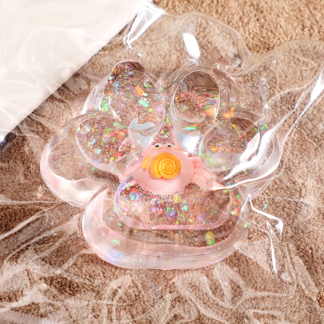 Jucarie Antistres Squishy, Flippy, cu Revenire Lenta, Squeeze Pinch Family, Model Cat Paw, 6.5 x 7 cm, din Tpr, 4-6 Ani, Model 6 Ocean, Transparent