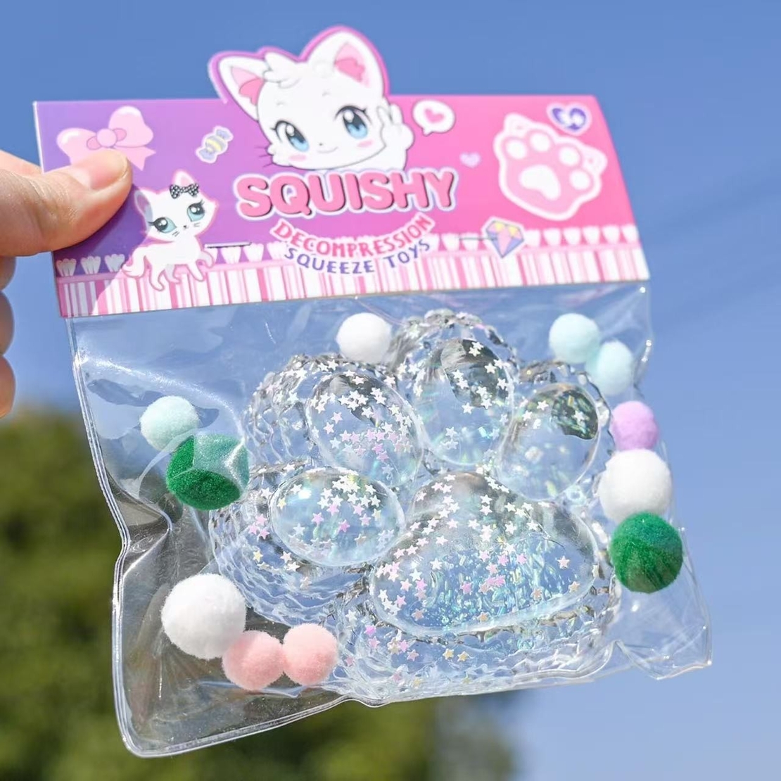 Jucarie Antistres Squishy, Flippy, cu Revenire Lenta, Model Labuta de Pisica Pufoasa, 12.5x10.5 cm, 220g, Squeeze Pinch Family, Albastru Transparent