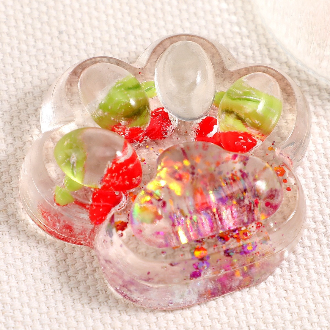 Jucarie Antistres Squishy, Flippy, cu Revenire Lenta, Squeeze Pinch Family, Model Cat Paw, 6.5 x 7 cm, din Tpr, 4-6 Ani, Model 5 Fructe, Transparent
