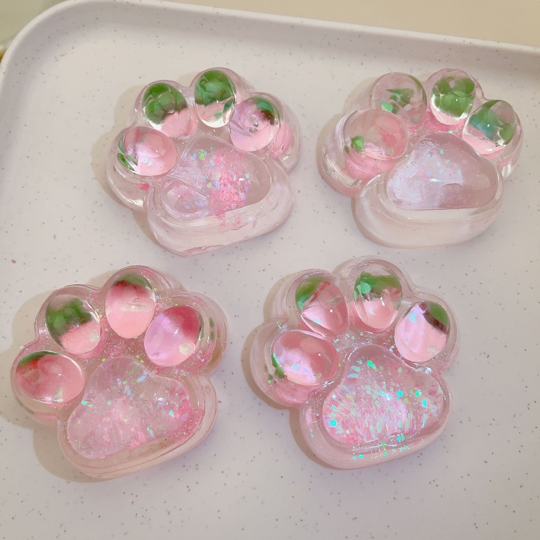 Jucarie Antistres Squishy, Flippy, cu Revenire Lenta, Labuta de Pisica Pufoasa, 7.5 cm, Ambalaj Transparent, Model 270522, Multicolor