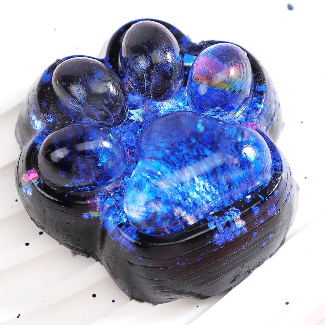 Jucarie Antistres Squishy, Flippy, cu Revenire Lenta, Squeeze Pinch Family, Model Labuta de Pisica cu Sclipici, 6.5x6 cm, 60g, Ambalaj Transparent, Albastru-Negru