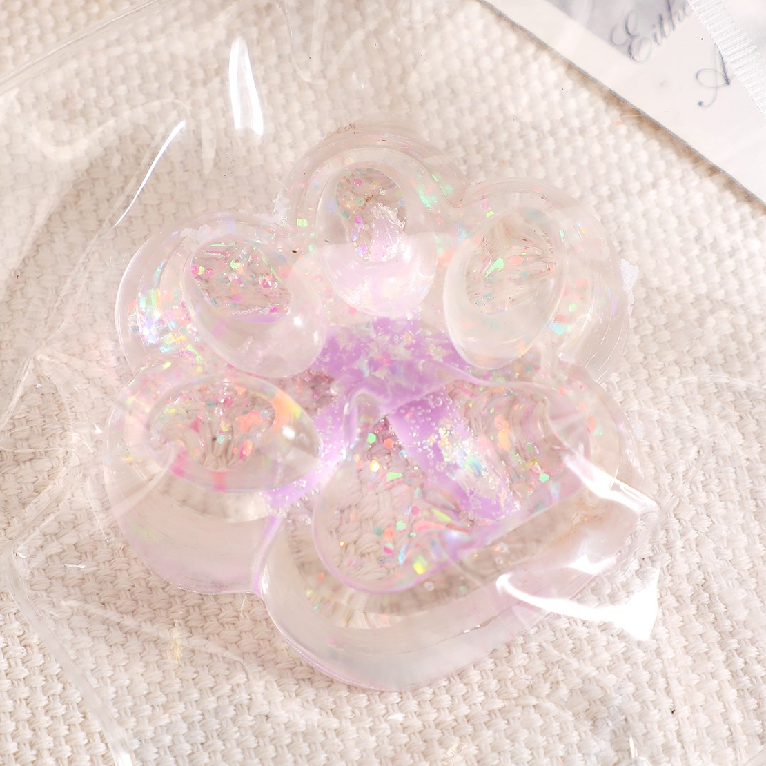 Jucarie Antistres Squishy, Flippy, cu Revenire Lenta, Squeeze Pinch Family, Model Cat Paw, 6.5 x 7 cm, din Tpr, 4-6 Ani, Model 2 Flori, Transparent