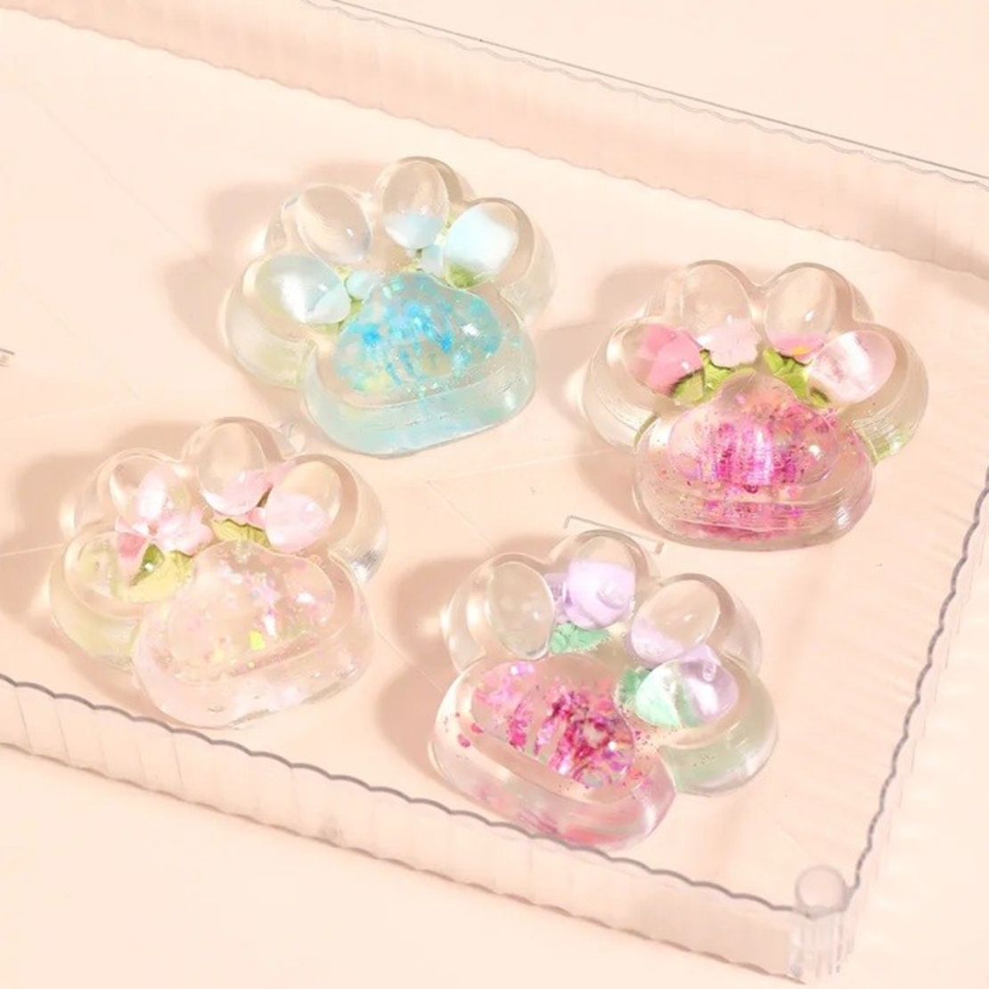 Jucarie Antistres Squishy, Flippy, Labuta de Pisica Pufoasa, cu Revenire Lenta, 7 x 6.5 cm, Model Flori 1, Transparent