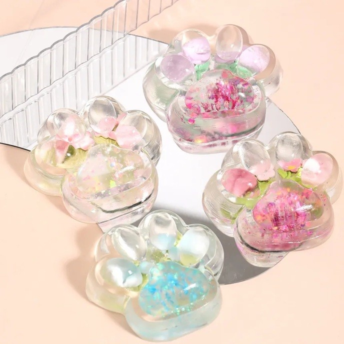 Jucarie Antistres Squishy, Flippy, Labuta de Pisica Pufoasa, cu Revenire Lenta, 7 x 6.5 cm, Model Flori 1, Transparent