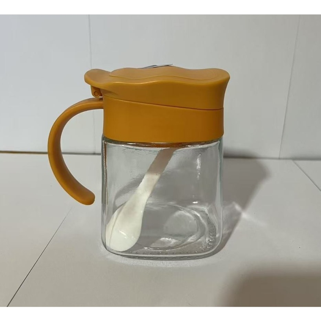 Recipient Condimente, Flippy, din Stilca, 180 ml, cu Maner si Lingurita, 11.3 x 8.2 cm, Capac Ondulat, Galben