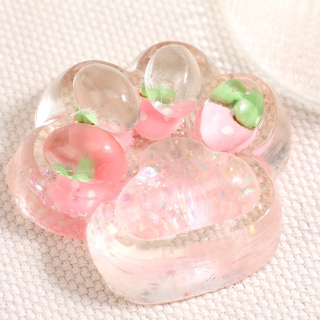 Jucarie Antistres Squishy, Flippy, cu Revenire Lenta, Squeeze Pinch Family, Model Cat Paw, 6.5 x 7 cm, din Tpr, 4-6 Ani, Model 5 Fructe, Transparent