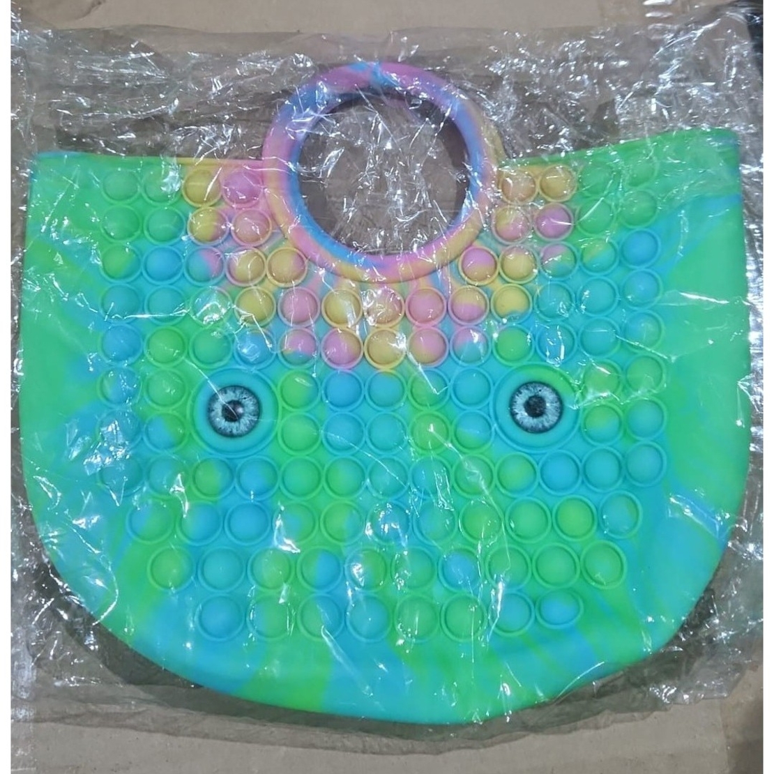 Jucarie Antistres, Flippy, Tip Pop It Now and Flip It, Geanta, din Silicon, 28 cm, Multicolor