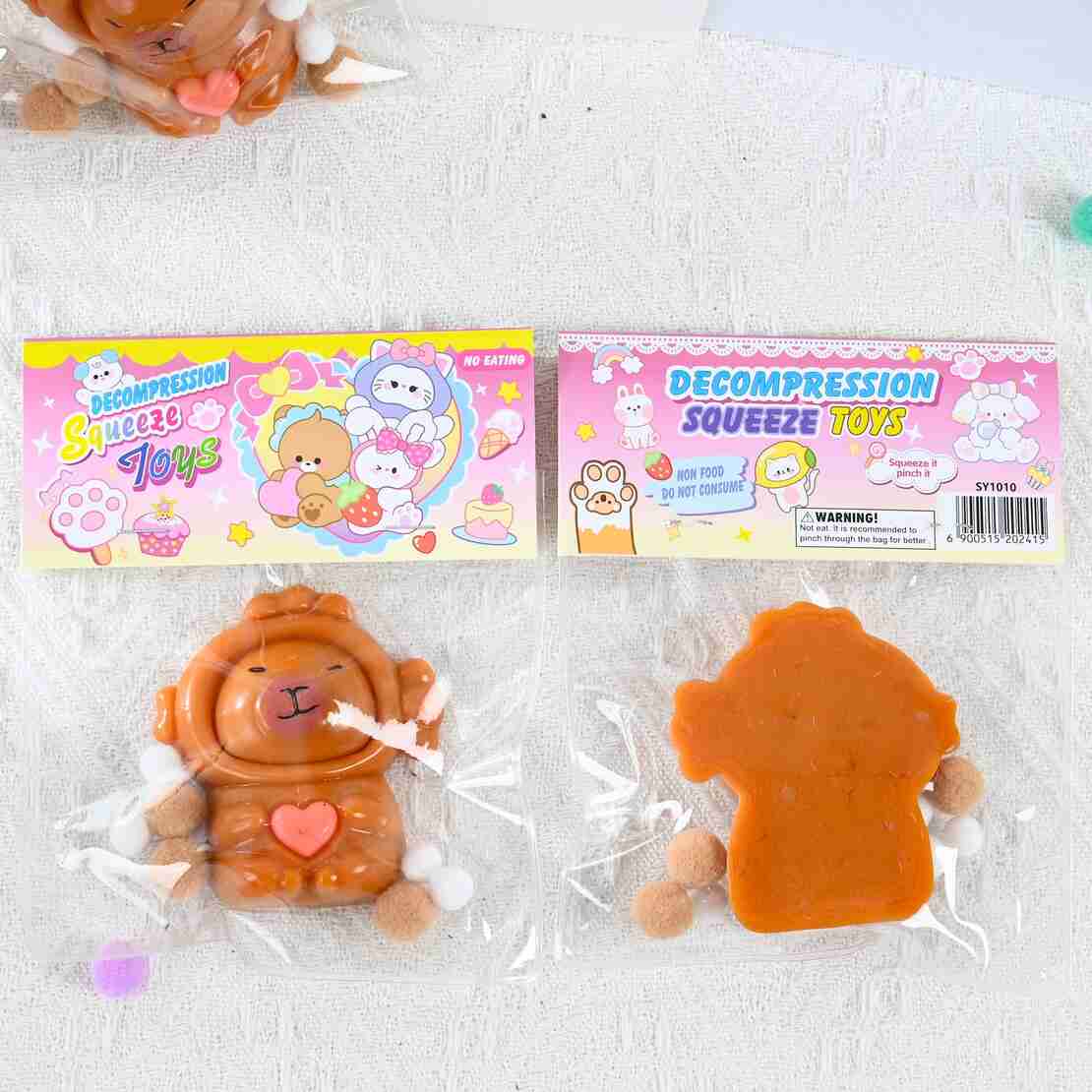 Jucarie Antistres Squishy, Flippy, cu Revenire Lenta, Model Capybara cu Inima, 7.5cmx6.5 cm, din TPR, Ambalaj Transparent, Maro