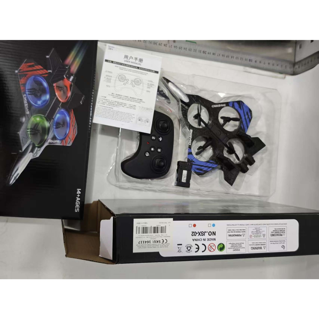 Avion de Lupta cu Telecomanda, Flippy, Tip Drona, din EVA (Spuma), cu Telecomanda, Incarcare USB, 2.4 GHz, Rotire 360°, Zbor pana la 120 m, LED, 25.5 x 18 x 5.2 cm, Negru-Albastru