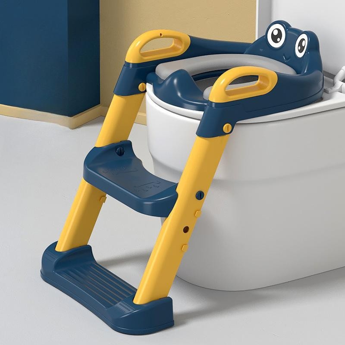 Reductor si Scaunel Inaltator WC, Flippy, pentru Copii 1 - 7 Ani, 2 Trepte Reglabile, Pliabil, Colac Moale, cu Spatar si Manere, Inaltime 54/58 cm x 39.5 x 35 cm, din Plastic+PVC, Albastru/Portocaliu