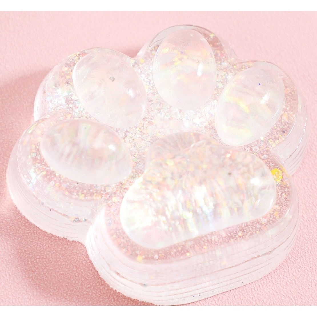 Jucarie Antistres Squishy, Flippy, cu Revenire Lenta, Squeeze Pinch Family, Model Cat Paw, 6.5 x 7 cm, din Tpr, 4-6 Ani, Model 4 Sclipici, Transparent