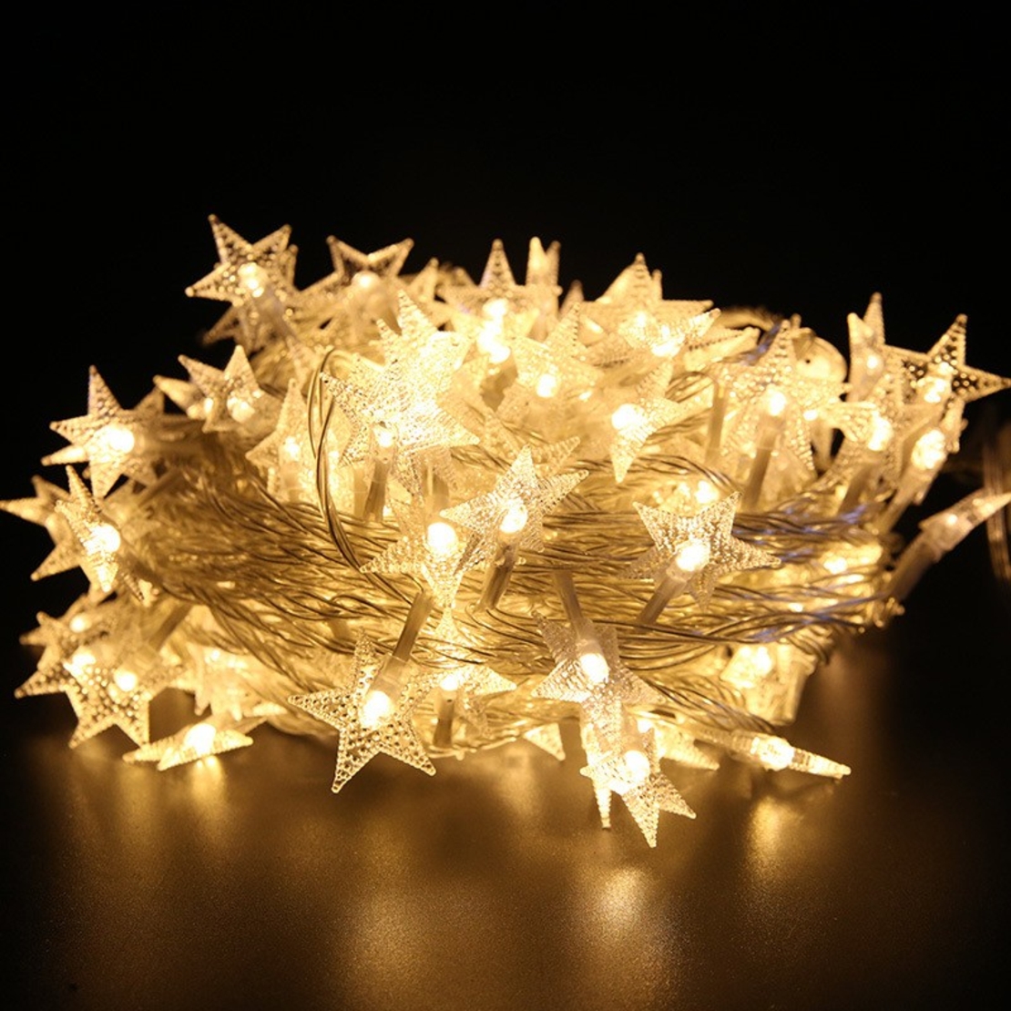 Instalatie Craciun cu baterii, 1.5 metri, 10 LED-uri tip Stea, fir Transparent, Alb Cald, Vafy