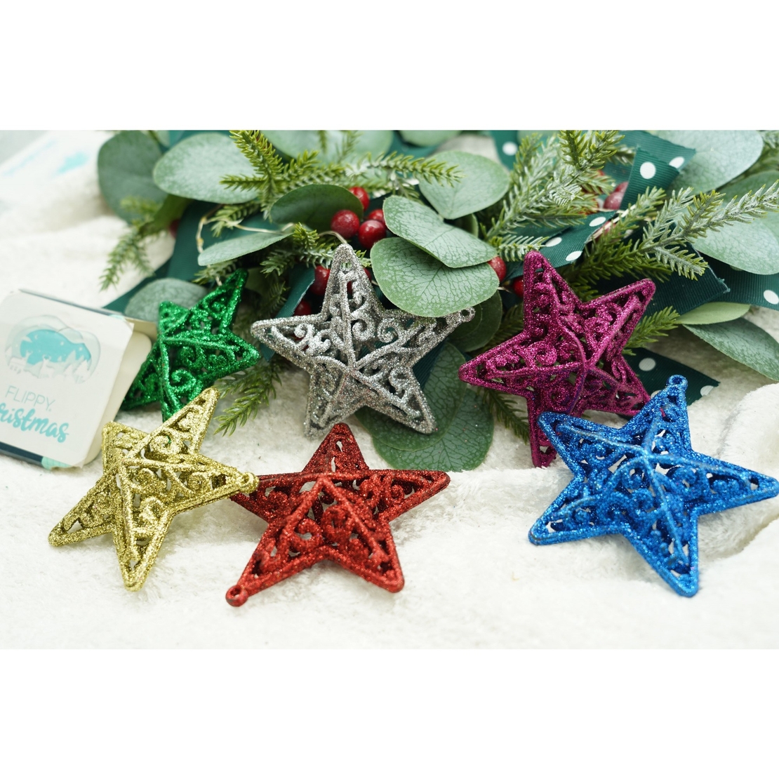 Set de 6 ornamente de brad, Flippy, de tip Stea, Multicolor, din plastic, cu finisaj sclipitor , cutie 3 cm adancime x 31 cm lungime x 9 cm inaltime