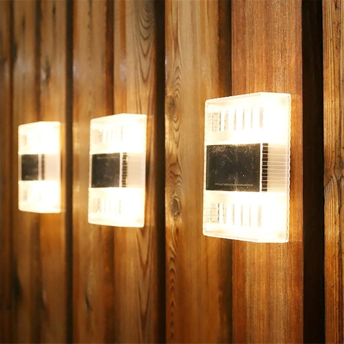 Aplica solara LED pentru Gradina, Flippy, Set 4 Bucati, ABS/Policarbonat, Rezistenta la apa IP65, pentru perete, 1.2V, 600mah, 10x2.5x7 cm, Lumina Alb calda, Transparenta