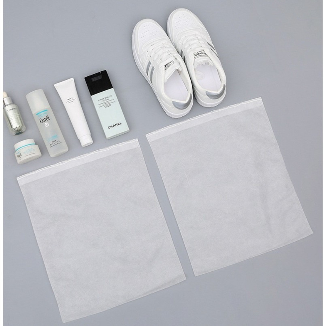Set 50 de Saci de Depozitare Incaltaminte, Flippy, de Protectie, pentru Voiaj, Netesut, Rezistenti la Praf, Protectie Solara, Anti-Ingalbenire, 38x24 cm, Marime Mica, Transparent