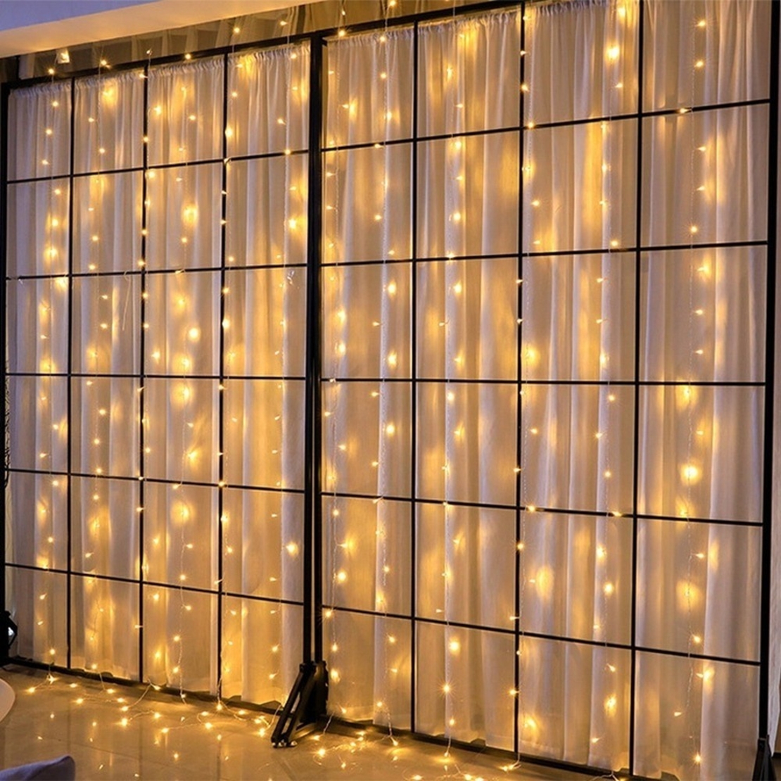 Instalatie Craciun, Tip Perdea, IP44, 1 m x 1 m, 60 LED-uri, Alb cald, 8 jocuri de lumini, Transformator cu telecomanda, Interconectabila, Prelungitor 3 m inclus, Fir transparent, Interior/ Exterior, Vafy
