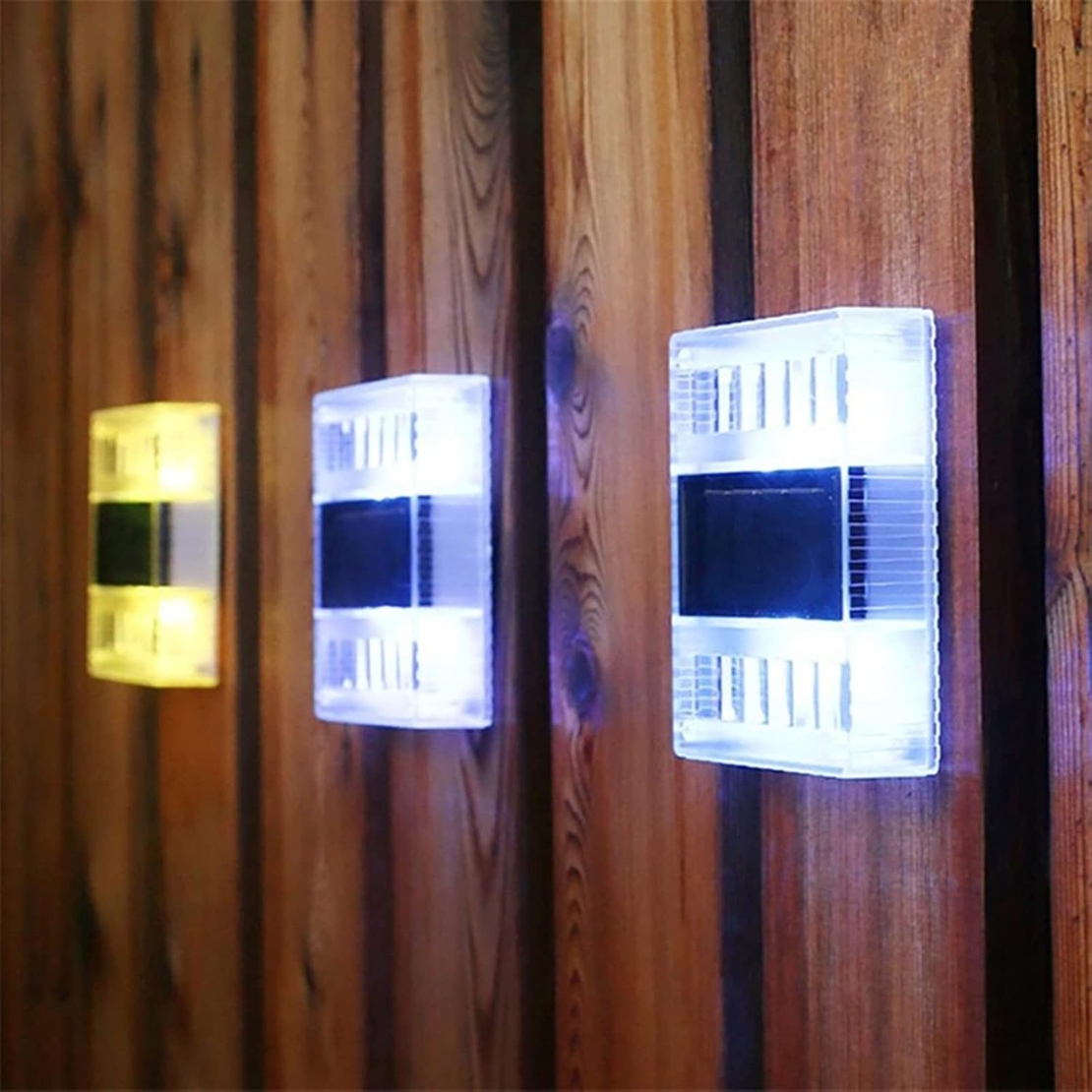 Aplica solara LED pentru Gradina, Flippy, Set 4 Bucati, ABS/Policarbonat, Rezistenta la apa IP65, pentru perete, 1.2V, 600mah, 10x2.5x7 cm, Lumina Alb calda, Transparenta