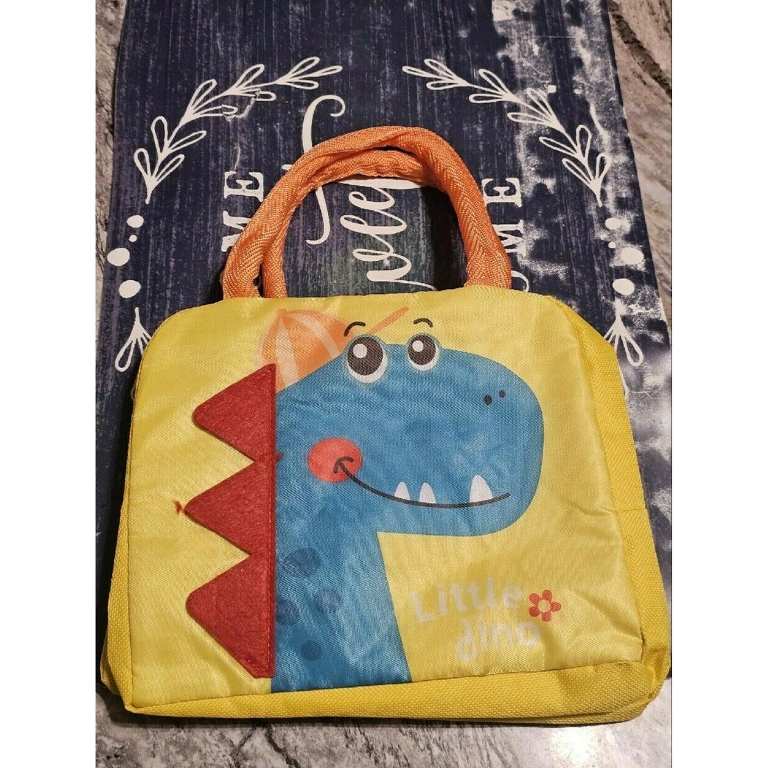 Geanta Termoizolanta pentru Copii, Flippy, 23x13x19 cm, Model Imprimeu Dinozaur, din Folie de Aluminiu si Panza Oxford, Albastru/Galben