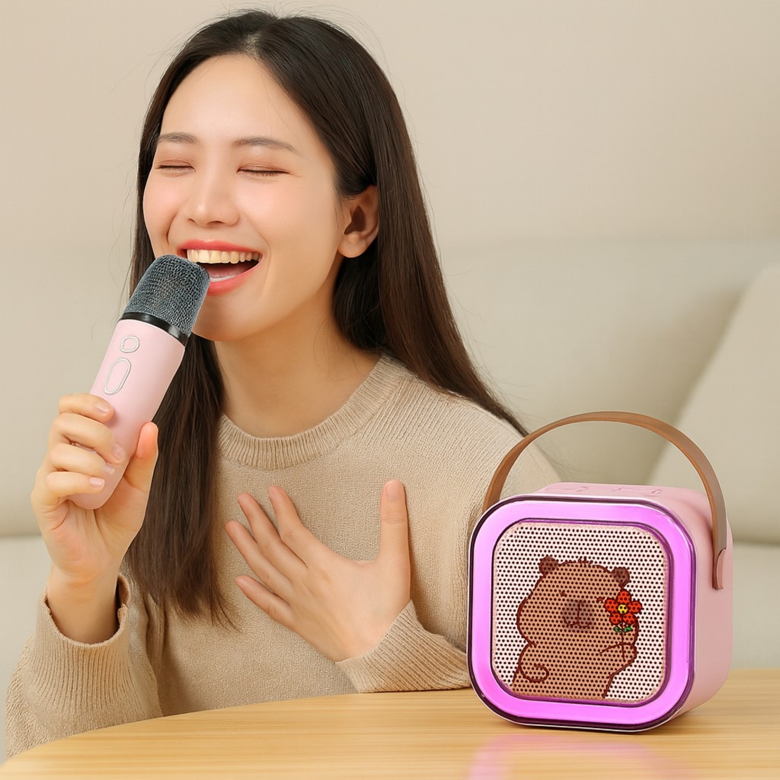 Boxa Portabila Karaoke, Vafy, Bluetooth 5.3, 5-10W, Set 2 Microfoane Wireless, LED RGB, 4 Efecte Vocale, Type-C, 14 x 11 cm, Roz