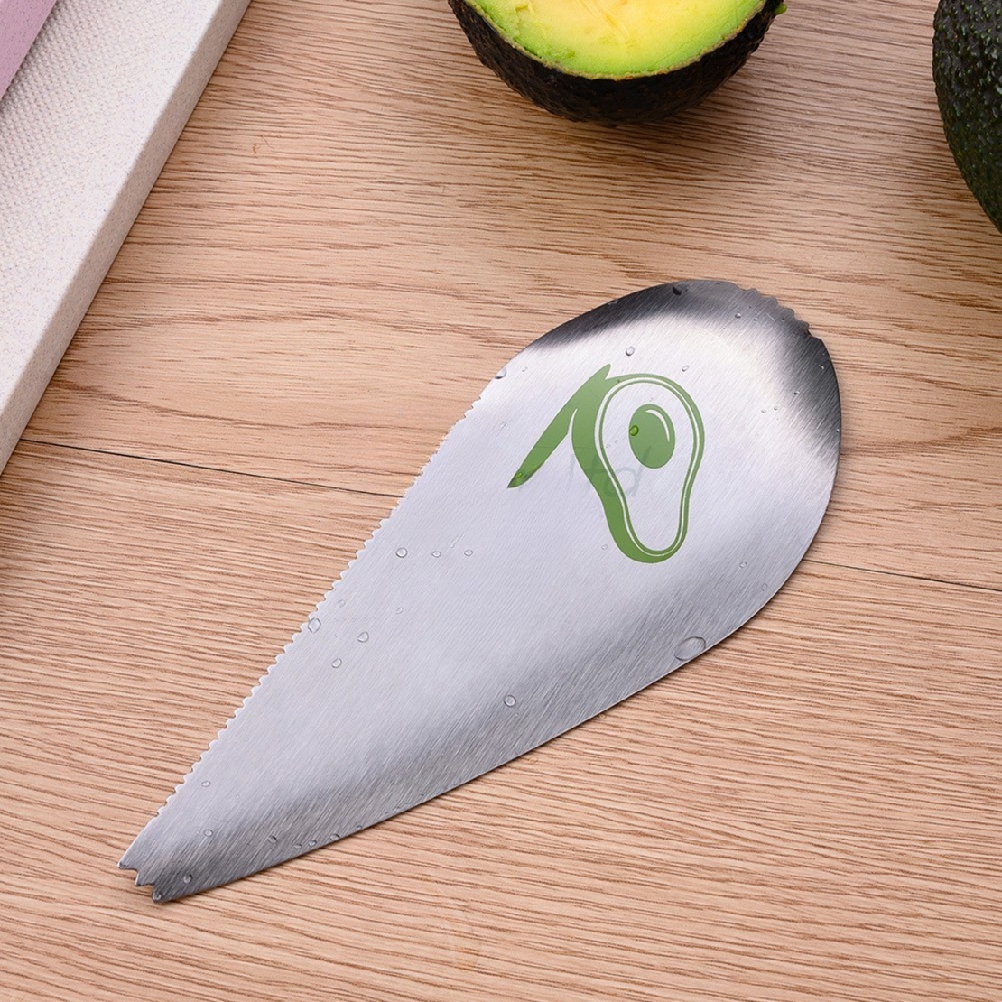 Taietor special pentru avocado Flippy, 3 in 1, forma curbata, zimti pentru apucare si taiere, din otel inoxidabil, 15 x 6 cm, gri
