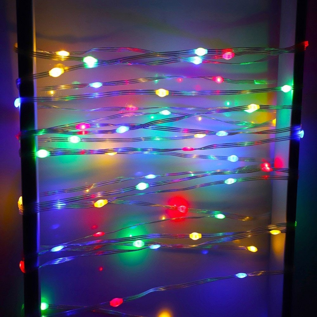 Instalatie de Craciun Vafy, liniara, cu 200 micro LED-uri, 20 m, 220V, conectare la retea, cu 8 jocuri de lumini, interior/exterior, fir transparent, 3 fire cupru, multicolora