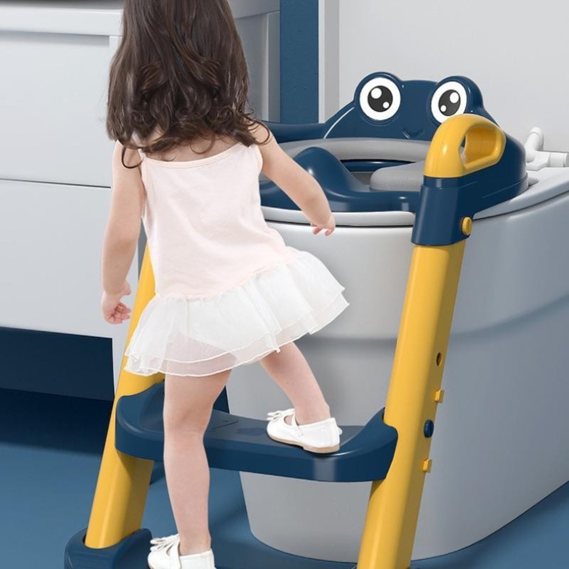 Reductor si Scaunel Inaltator WC, Flippy, pentru Copii 1 - 7 Ani, 2 Trepte Reglabile, Pliabil, Colac Moale, cu Spatar si Manere, Inaltime 54/58 cm x 39.5 x 35 cm, din Plastic+PVC, Albastru/Portocaliu