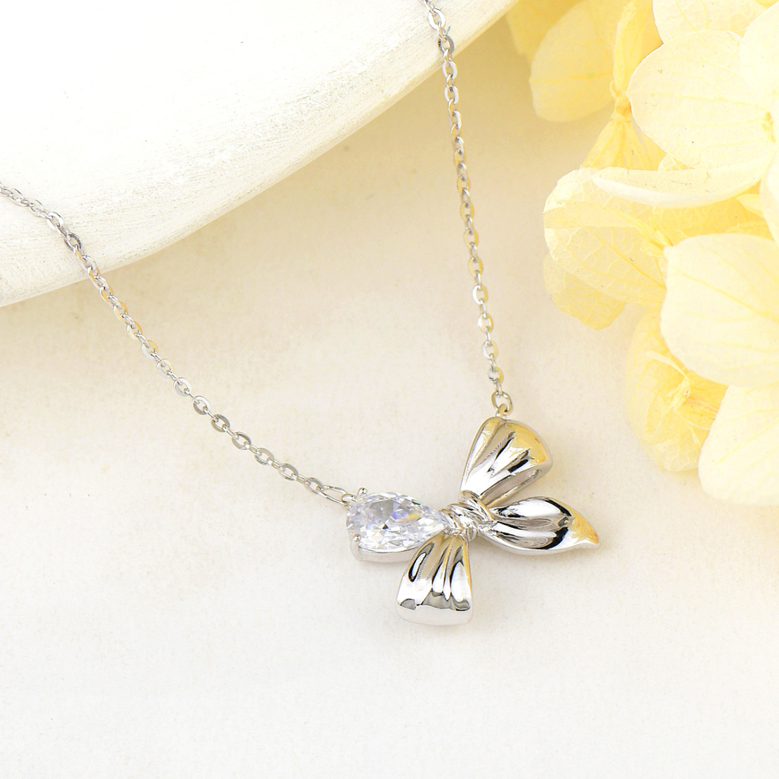RIBBON SILVER NECKLACE